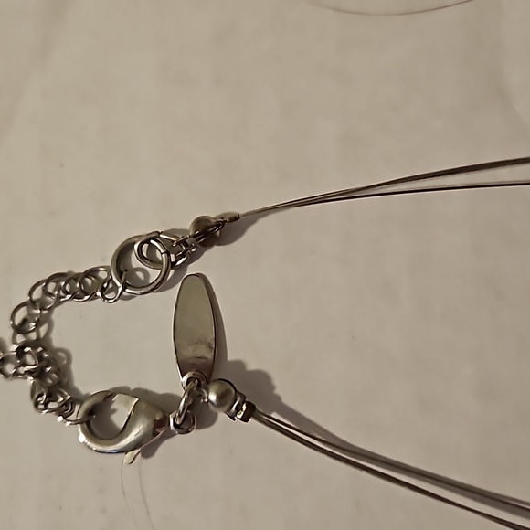 Green and silver necklace. Adjustable size. Great way to dress up an old outfit. - Picture 5 of 7